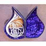 A B&H piston French horn, in a fitted, fabric lined,