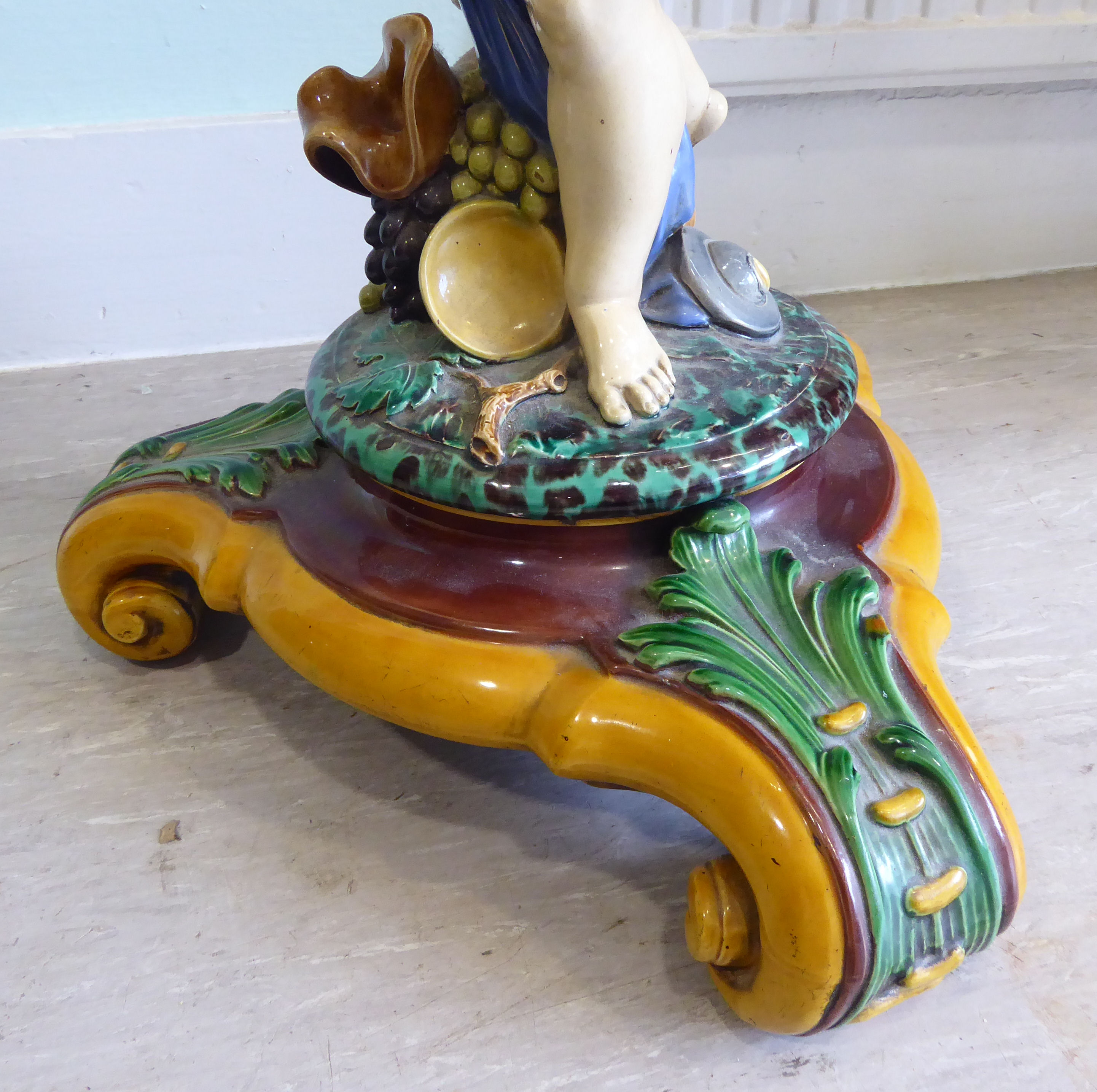 A late Victorian Minton majolica jardiniere stand, featuring a shallow floral decorated, - Image 2 of 11