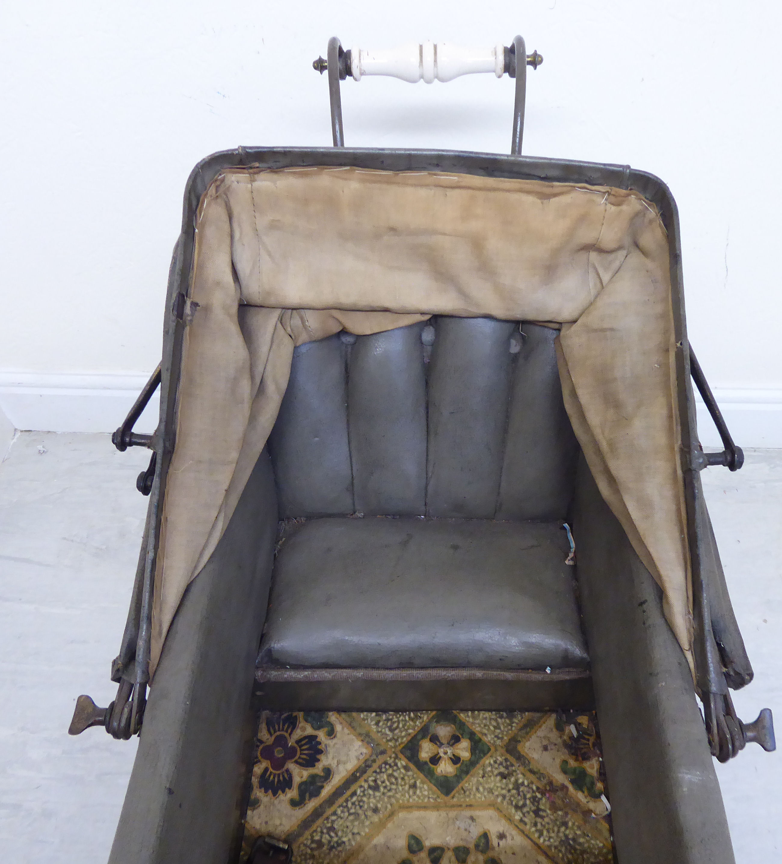 A late Victorian painted wooden dolls pram with a retractable canopy and a grey hide upholstered - Image 8 of 8