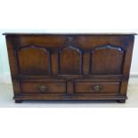 A Titchmarsh & Goodwin Old English style oak hi-fi cabinet, fashioned as a dower chest,