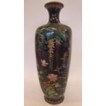 An early 20thC Japanese cloisonne vase of tapered and panelled baluster form,