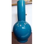 A 20thC Chinese turquoise glazed porcelain bulbous bottle vase with a long, wide, straight neck 25.