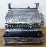 A late 19thC National Cash Register Co ornately cast silvered metal grocer's till no.