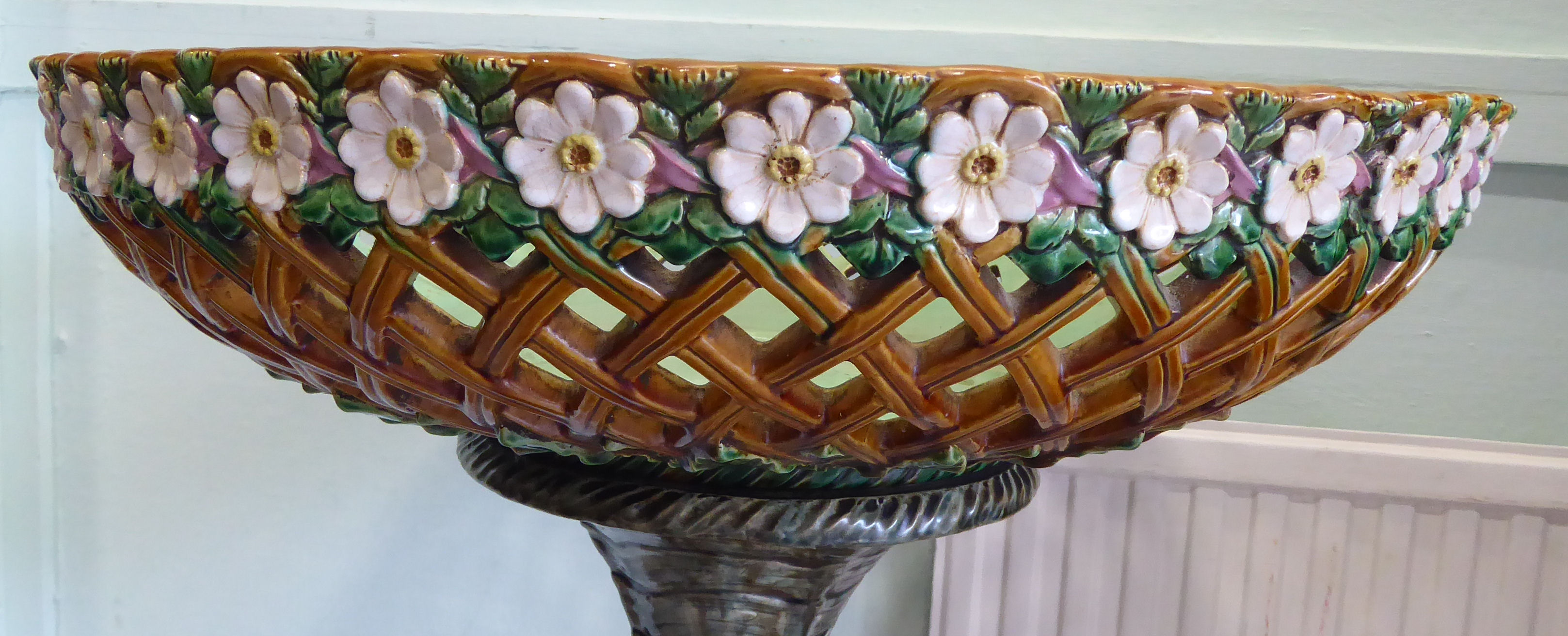 A late Victorian Minton majolica jardiniere stand, featuring a shallow floral decorated, - Image 5 of 11