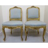 A pair of early 20thC Continental Louis XV style side chairs with moulded,