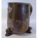 A silver tankard of cauldron design with a flared rim, a cast and applied crown emblem,
