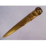 A late 19th/early 20thC French gilt bronze letter opener of tapered form,