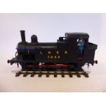 A 0 gauge tinplate 0-6-0 electric model tank locomotive,