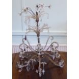 An early 20thC Italian gilded wire and crystal chandelier frame, comprising six scrolled branches,