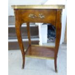 A modern Continental 'antique' inspired occasional table with a low brass gallery upstand,