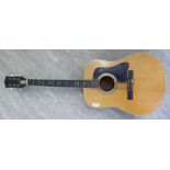 A six string acoustic guitar BS