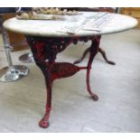 A late Victorian painted and decoratively cast iron pub table with a mottled grey marble top,