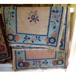 A pair of Chinese rugs,