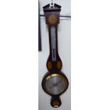 An Edwardian banjo shaped, aneroid barometer, comprising an engraved,