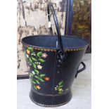 A late 19th/early 20thC Toleware bucket of tapered and waisted oval form with a riveted fixed and a