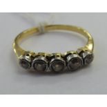 A yellow metal five stone diamond ring 11