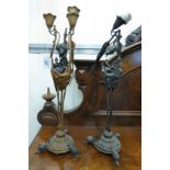 A pair of Art Nouveau design cast metal candlestands of organic form,