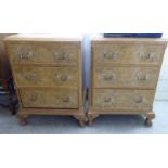 A pair of modern bleached burr walnut finished three drawer bedside chest,