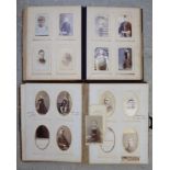 Two similar late Victorian photograph albums,