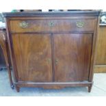 A mid 19thC Dutch flame veneered mahogany sideboard, the top with outset canted corners,