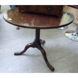 A George III mahogany tip-top pedestal table,
