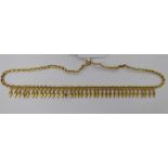 A 9ct gold necklet with pendant arrow links 11