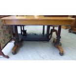 A late 19thC burr veneered maple and mahogany library table,