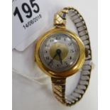 A lady's 18ct gold round cased wristwatch,