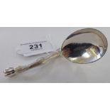 A silver caddy spoon,