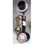 A 1930s black enamelled steel and brass candlestick design,