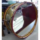 A Timothy Oulton military drum design hanging display cabinet with glazed mirror panels & LED