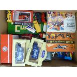 A collection of various diecast and other model vehicles,