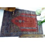 A Persian prayer rug,