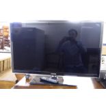 A Samsung 40'' flatscreen television with remote control BSR