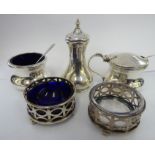 A three piece silver condiments set of squat, bulbous form comprising a pepper pot,