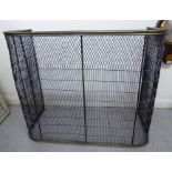 A late Victorian latticed and railed wire nursery fireguard with a brass rim 31''h 37''w S