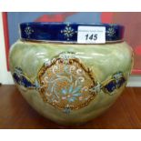 A late Victorian Royal Doulton stoneware jardiniere pot, decorated with lace pressed flora,