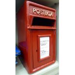 A red painted cast iron postbox 17''h 9.