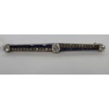 A three stone sapphire and diamond bar brooch 11