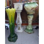 Ceramics: to include a late Victorian jardiniere and stand, decorated with flora,