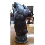 A cast and patinated bronze statue,