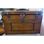 An early/mid 20thC light oak tool chest with straight sides and a hinged lid,