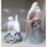 A Royal Copenhagen porcelain model, a pair of parrots no.649 7.