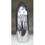 A novelty stainless steel cocktail shaker,