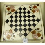 A pietra dura inlaid chequerboard with flora and foliate spandrels 16''sq TOS9