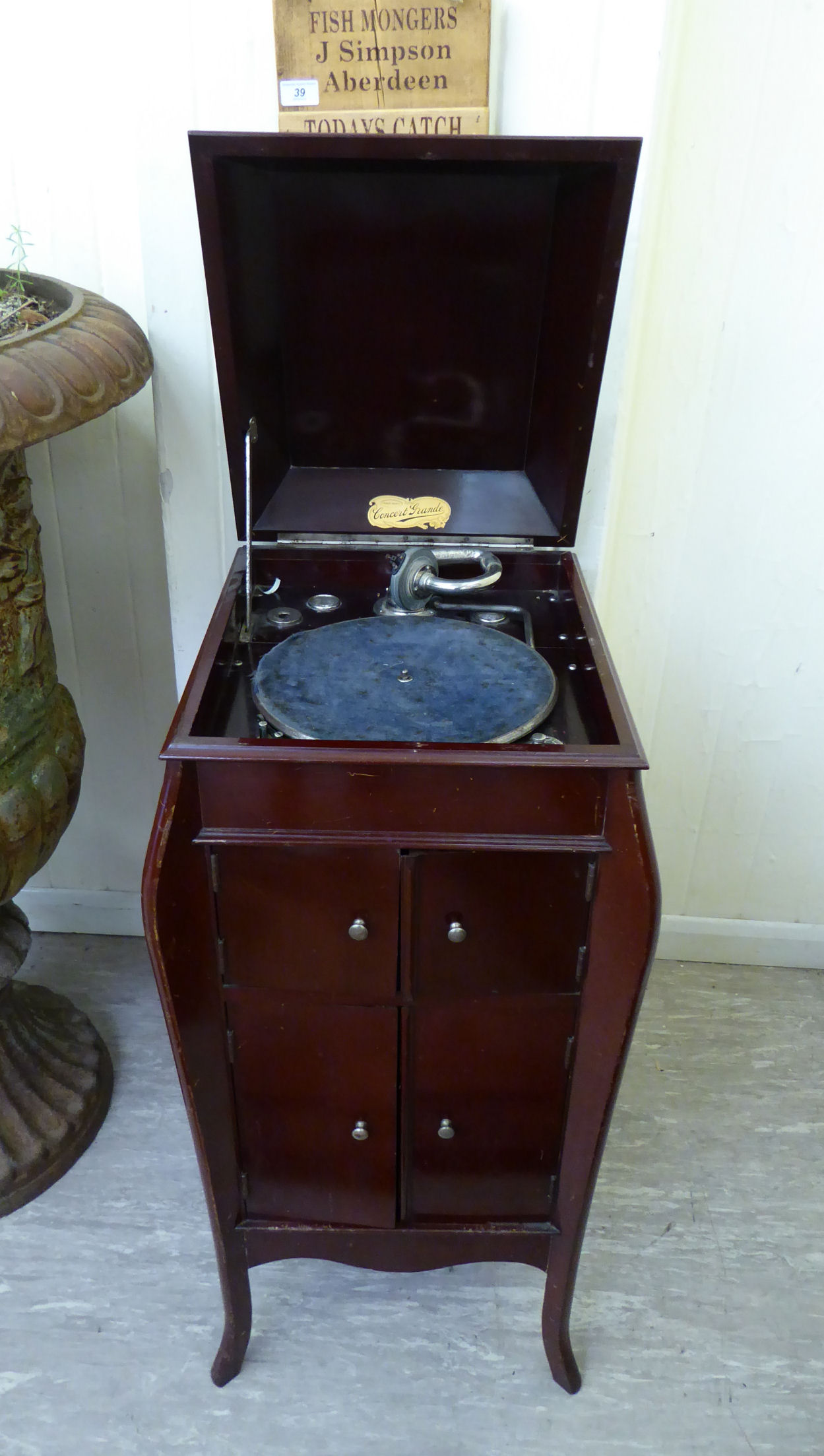 A 1930s mahogany finished, freestanding Concert Grande gramophone cabinet, raised on slender,