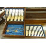 A set of twelve engraved silver plated fish knives and forks,