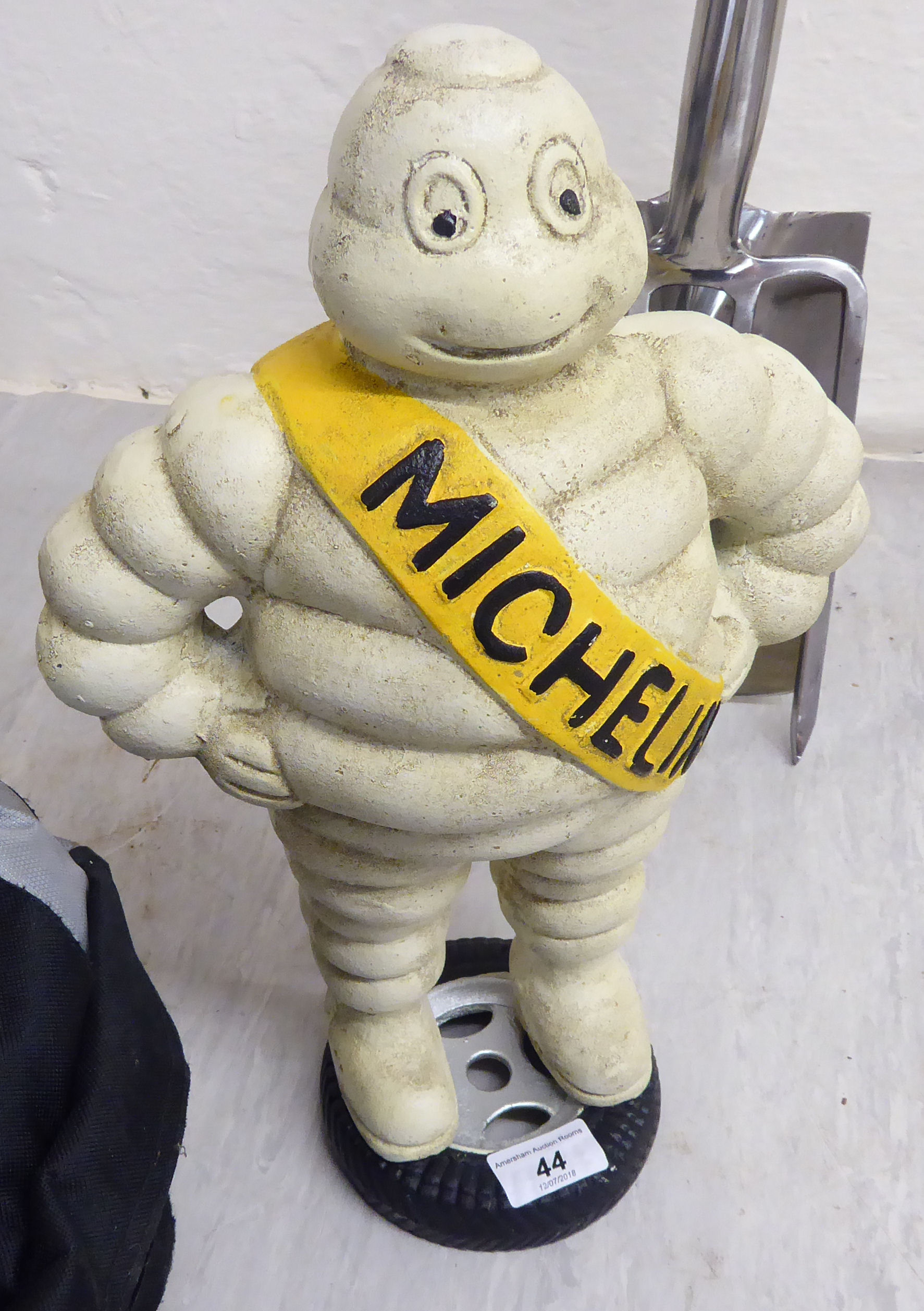 A painted cast iron promotional figure 'The Michelin Man' 14''h BSR