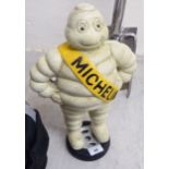 A painted cast iron promotional figure 'The Michelin Man' 14''h BSR