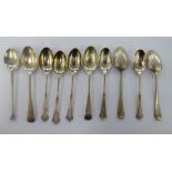 Ten silver teaspoons in various patterns mixed marks 11